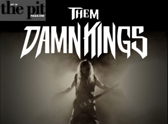 A monochrome image of a person with long hair playing an electric guitar on stage, with the band name "Them Damn Kings" displayed above in bold lettering.
