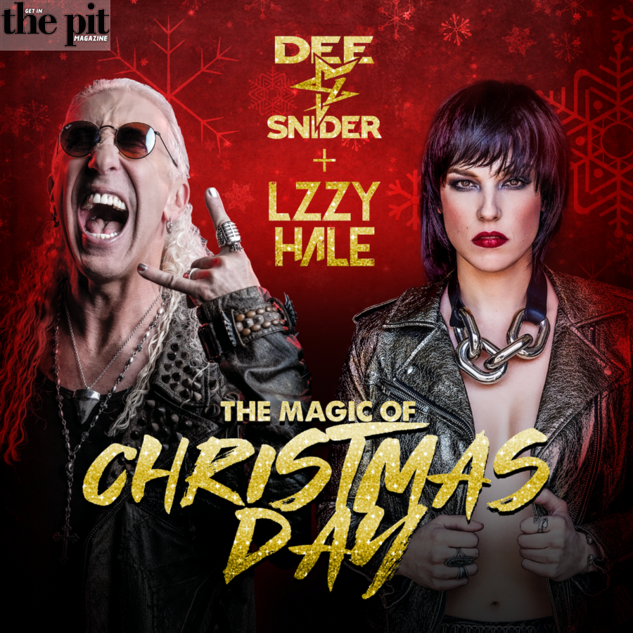 Dee Snider and Lzzy Hale are featured in the promotional image for "The Magic of Christmas Day," where Snider holds a microphone and Hale sports a chain necklace, against a festive background