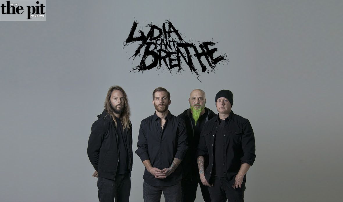 Four members of "Lydia Can't Breathe" laid to rest, standing in a row wearing dark clothing, with the band's logo above them in a distressed font.